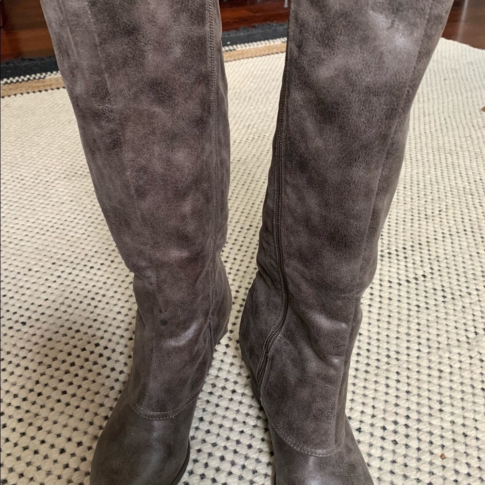 Fergaliscious, by Fergie tall boots.